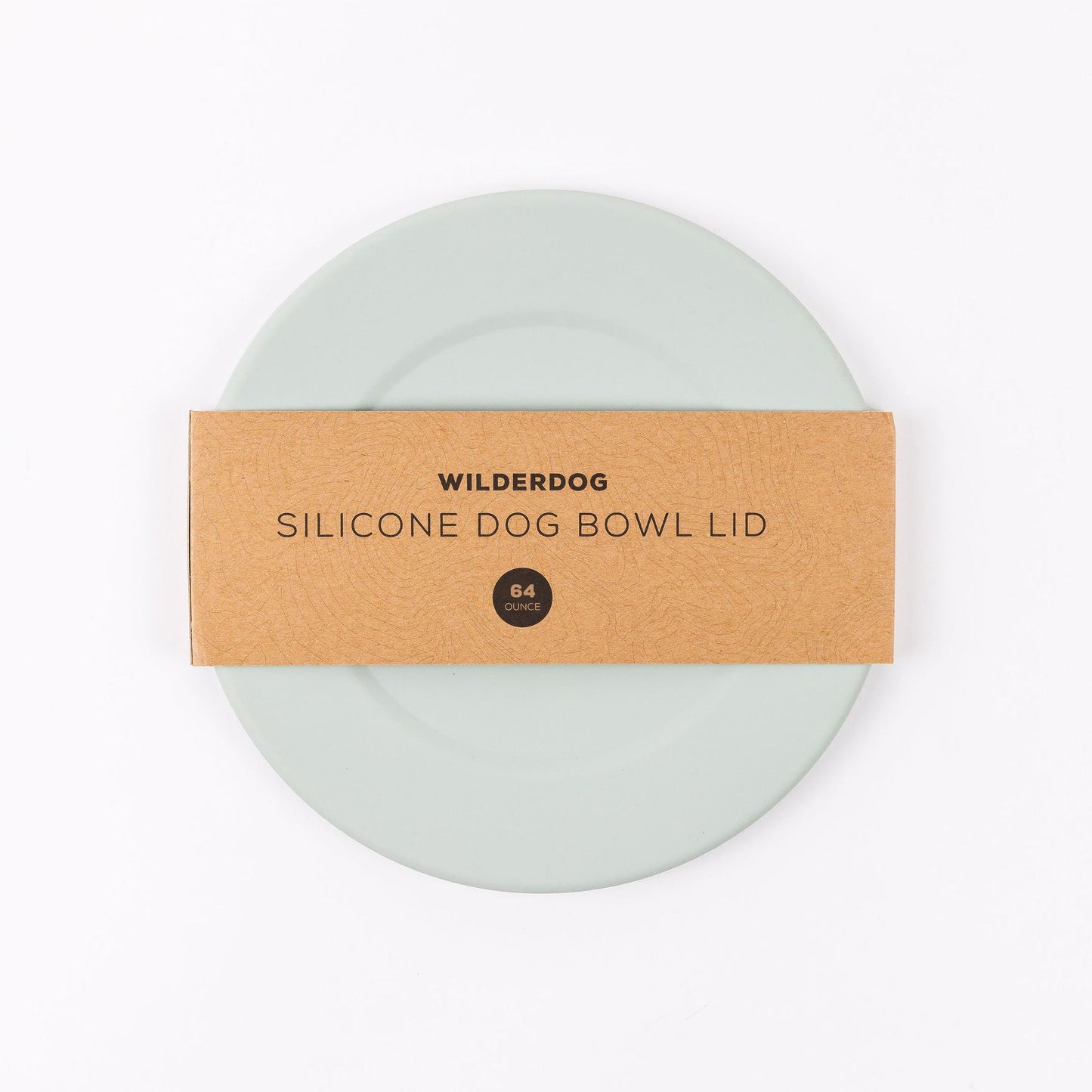 The Silicone Bowl Lids are round and light green, made from food-grade silicone. They come packaged with a brown paper band that reads "Wilderdog Silicone Dog Bowl Lid" and specifies "64 ounce" in a black circle. These lids are perfectly compatible with Wilderdog's Stainless Steel Dog Bowls and are dishwasher safe.