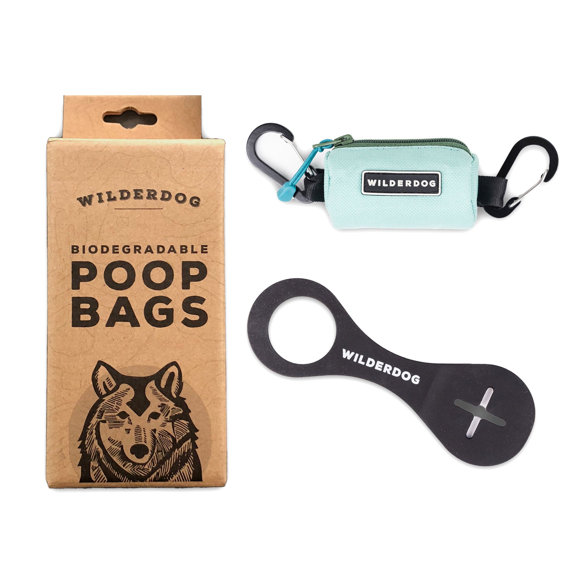 Photo of the Ultimate Poop Kit by Wilderdog, featuring a box of biodegradable dog waste bags, a mint green carrying pouch with carabiners, and a black circular attachment tool. The brand's name is displayed on each item. The box showcases an illustration of a dog's head, making it both practical and stylish for managing dog waste.